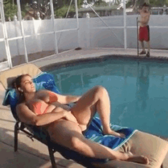 Sexy Slut Laying on the Pool Chair picture 1 of 1