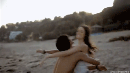 Sexy Beach Babe Gets Her Kiss On picture 1 of 1