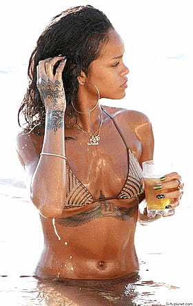 Best Photos of a Bikini Babe with Tattoos and a Drink'