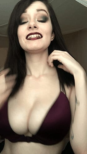 Babes with Big Tits in a Bra: A Non-Nude Brunette's Sultry Gaze'