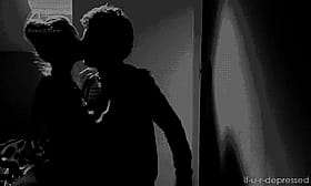 Sexy Seduction: Two Men Kissing in the Dark'