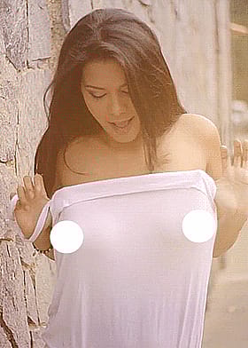 Busty Brunette Exposes Her Big Tits'