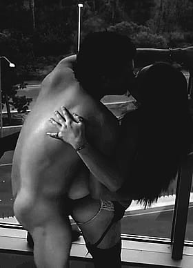 Public Sex: Two Naked People Making Out on a Balcony'
