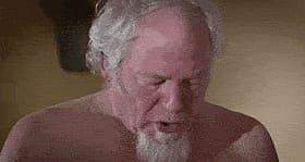 Babes, this old man is getting a blowjob from a brunette'