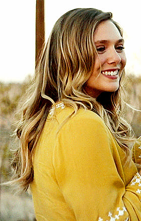 Blonde Celebrity Elizabeth Olsen in Yellow'