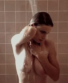 Brunette Pornstar's Big Tits Steam Up the Shower'