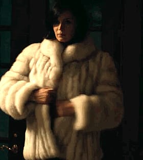 Celebrity Lingerie Model Poses in White Faux Fur Coat'