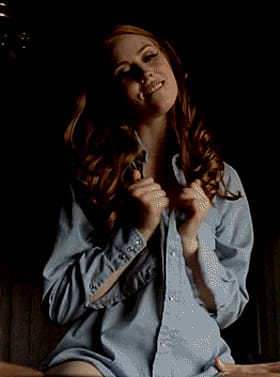 Redheaded Babe Flashes Her Non-Nude Body in a Blue Shirt'