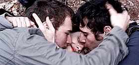 Tres Sexy Men Kissing Each Other'