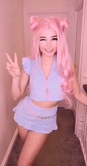Babes, Belle, Cute, Delphine: Pink-haired Beauty Poses for Peace'