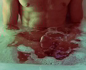 Sexy Shirtless Man in Bathtub'