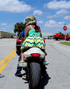 Riding the Motorcycle with a Hot Amateur Flashing Her Thighs'