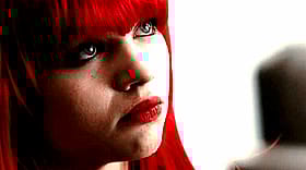 Babes in Red: A Celebrity's Sultry Stare'
