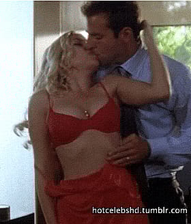 Best Photos of a Man and Woman Kissing in Red Lingerie'