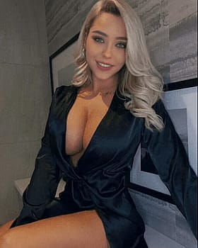 Sexy Blond Babe in Black Dress, No Nudity'