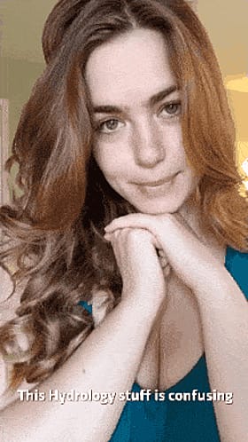 College Caption Queen: Redheaded Beauty Poses for the Camera'