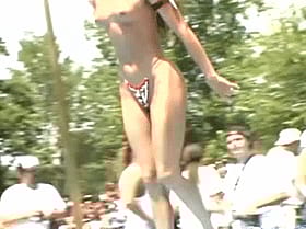 Nakita Kash's Outdoor Public Show: A Somersaulting Stripper's Sizzling Stage Performance'