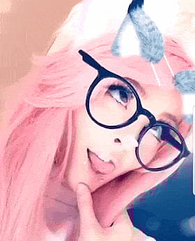 Cute Pink Snakebites Teen with Glasses Strikes a Sexy Pose'