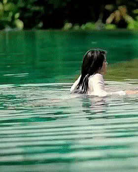 Wet and Beautiful: A Non-Nude Thong Bikini Adventure'
