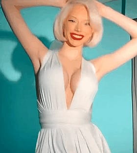 Blonde Retro Bombshell Flashes Her Boobs in White Dress'
