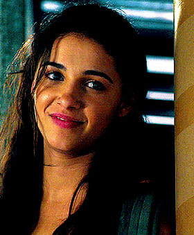 Naomi Scott's British Brunette Beauty: A Celebrity's Sultry Seduction'