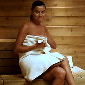 Brunette Amateur Gets Naked in Wooden Sauna'