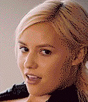 Seductive Blonde Winks and Bites Her Lip'