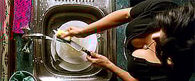 Sexy Chick Washing Dishes in the Kitchen'