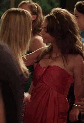 Blonde Babes and Brunette Celebrity: A Red Dress and a Hand on the Shoulder'