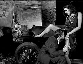 Hot Brunette Giving Cunnilingus to Girlfriend in Vintage Car'