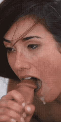 Busty Brunette Blows a Big Cumshot picture 1 of 1