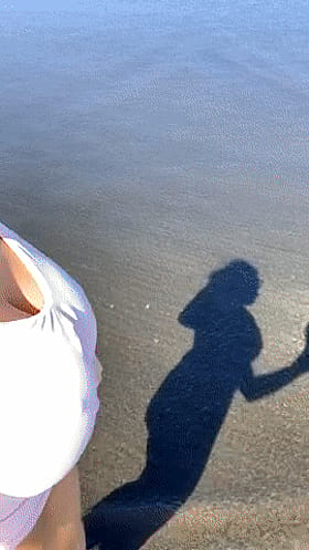 Big Tits Beach Babe Shadow Play'