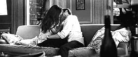 Get Your Kink On: Two People Making Out on a Couch'