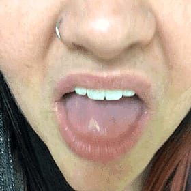 Amateur Chick's Tongue Sticking Out'