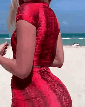 Big Tits Beach Babe in a Red Dress'